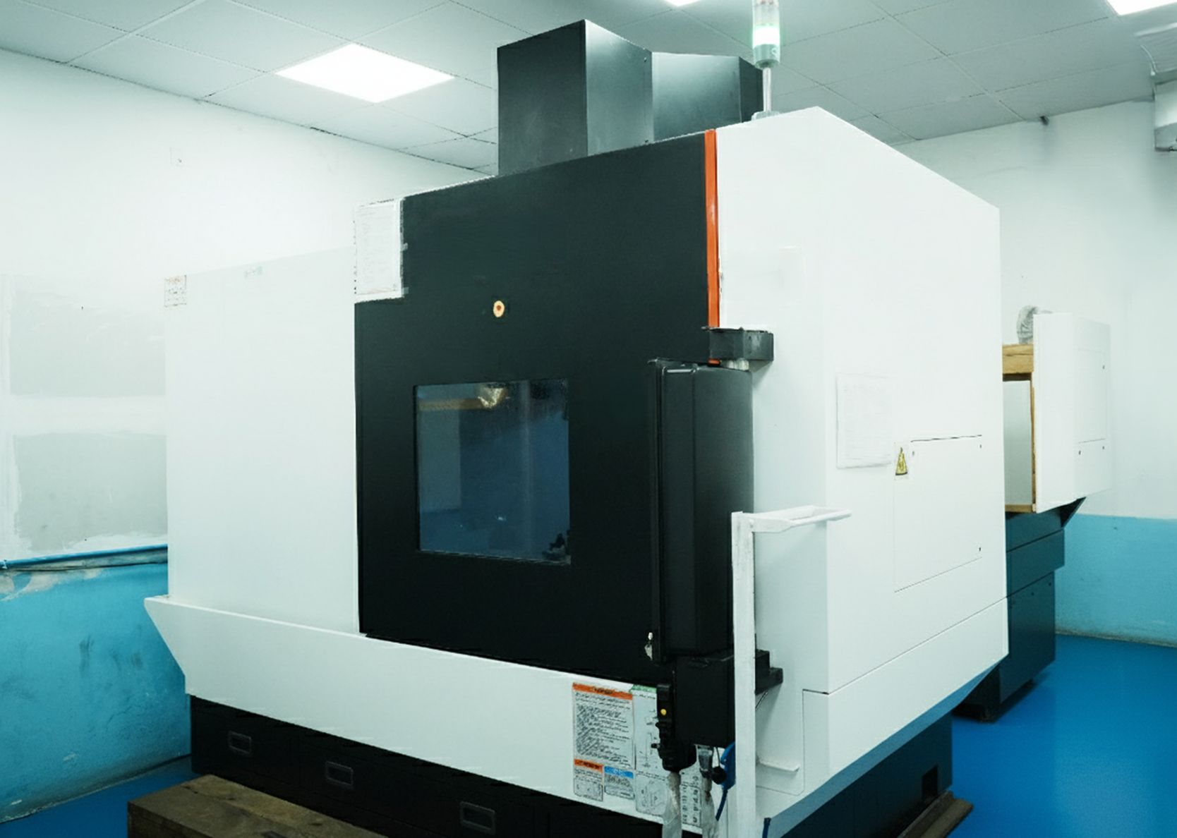 Vertical machining centre with rotary table capability at RAVIS